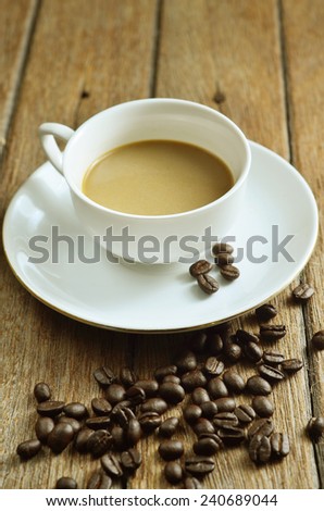 Coffee cup and beans.