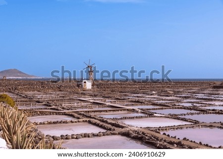 View Over The Salt Ponds To Arinaga And The Volcano Arinaga In The Southeast Of Gran Canaria