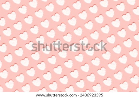 Pattern with hearts made of snow on pink background. Valentines day concept. Top view, flat lay.