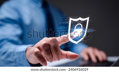 Administrator safeguards cyberspace with a laptop, implementing robust firewall technology for network security, ensuring the safety and privacy of sensitive information in the digital realm. Royalty-Free Stock Photo #2406926029