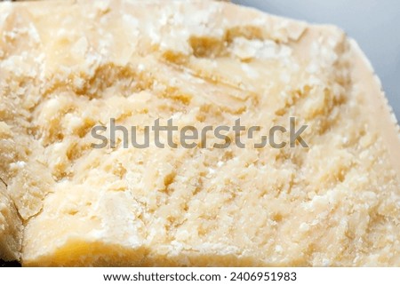 Close-up of Parmigiano Reggiano Parmesan cheese Royalty-Free Stock Photo #2406951983