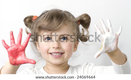 Cute girl playing with colors