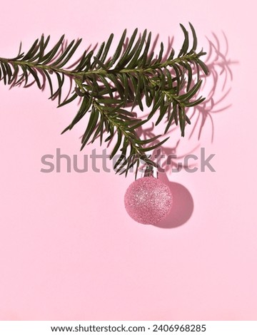 Christmas tree decorated, detail, pastel background, creative copy space, winter holidays greeting card.