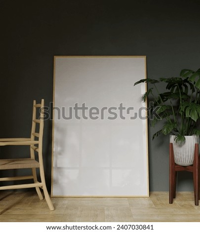 wooden frame mockup poster leaning on the green wall in between chair and plant decoration with aesthetic view