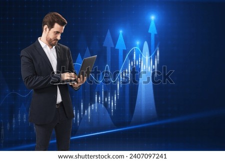 Attractive young european businessman using laptop with growing forex chart with bright upward arrow on blurry pixel background. Success, financial growth and trade concept