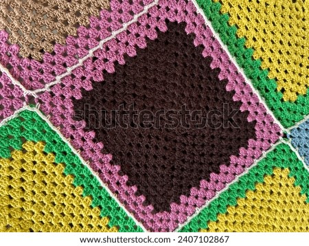 Close up pictures of grandma ‘s square crochet thread