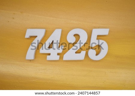 The golden yellow painted wood panel for the background, number 7425, is made from white painted wood.
