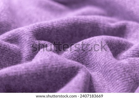Textile background soft cashmere texture.New wool products with label.  Royalty-Free Stock Photo #2407183669