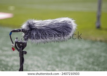 microphone recording voice at a football match