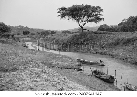 riverbed with rowboat outdoor. riverbed with rowboat at water. riverbed with rowboat Royalty-Free Stock Photo #2407241347