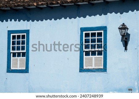 Construction with characteristic colonial architecture in the historic Sao Joao del Rei, city ​​of the gold cycle in the colonial period on Minas Gerais state, Brazil Royalty-Free Stock Photo #2407248939