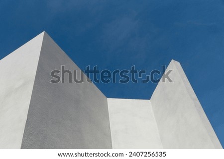 white concrete architecture with blue sky