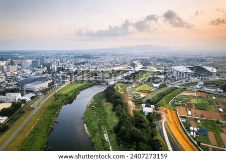 Toyotashi, Aichi, Japan cityscape on the Yahagi River. Royalty-Free Stock Photo #2407273159