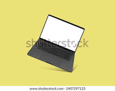 Laptop or notebook space black with blank screen isolated with clipping path on yellow background.