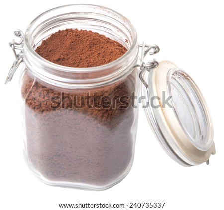 Instant coffee drink powder in glass jar container over white background 