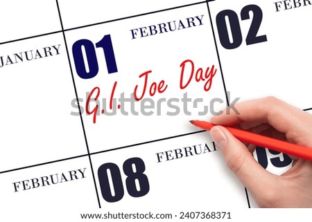 February 1. Hand writing text G.I. Joe Day on calendar date. Save the date. Holiday.  Day of the year concept. Royalty-Free Stock Photo #2407368371