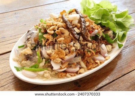 Spicy Glass Noodle Salad (Yum Woon Sen), Authentic Glass Noodle Salad
.Spicy noodle salad, Spicy vermicelli salad, Thai food. Royalty-Free Stock Photo #2407370333