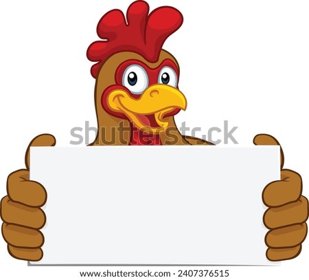 A chicken rooster cockerel cartoon character mascot holding a sign 
