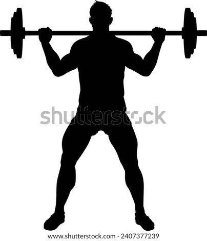 A weight lifting muscle man or bodybuilder weightlifting weights in silhouette Royalty-Free Stock Photo #2407377239
