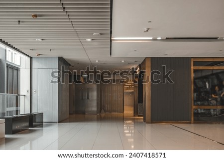 Indoor elevator exits in shopping centers Royalty-Free Stock Photo #2407418571
