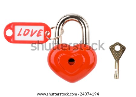Image of metallic heart with love label and key