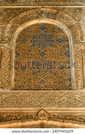 Islamic-style window and decoration in Alhambra. Spain. The medieval place is a Unesco World Heritage Site