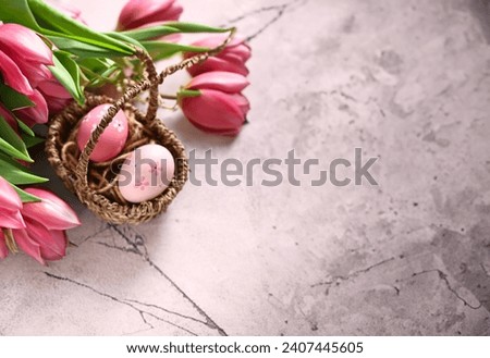 Easter composition with tulips and beautiful eggs