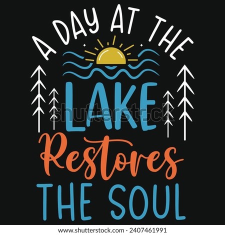 A day at the lake restores the soul summer typography tshirt design  Royalty-Free Stock Photo #2407461991
