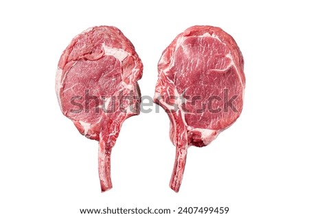 Raw Tomahawk beef (veal) steak Isolated on white background, top view Royalty-Free Stock Photo #2407499459
