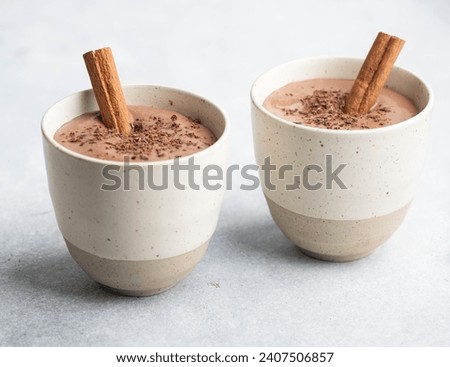 Champurrado, traditional mexican corn drink with chocolate, selective focus Royalty-Free Stock Photo #2407506857