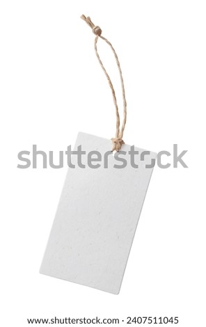 Blank price tag tied with string isolated on white background