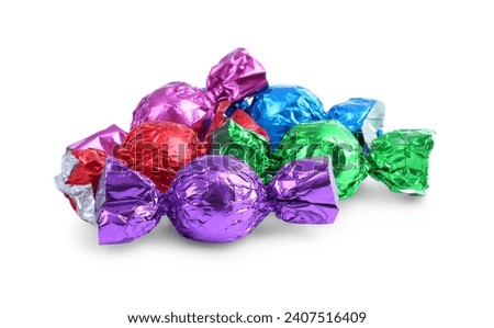 Tasty candies in colorful wrappers isolated on white Royalty-Free Stock Photo #2407516409