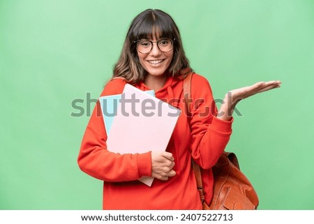 Young student caucasian woman over isolated background with shocked facial expression