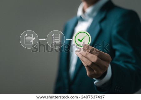 Businessman holds wooden blocks with correct marks to paperless online approval for business process workflow illustrating management approval and and project approve concept.