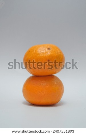 Fresh Mandarin Oranges on studio Background