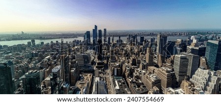 Panoramic photo of the New York skyline, with aerial views of the Big Apple from the Empire State Building of the United States of America.