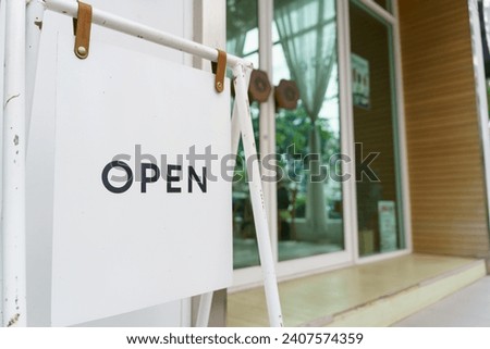 Open sign board. Board or start of opening Welcome entrance of Small business cafe or restaurant and advertising with open sign.