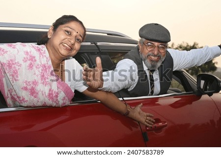 Portrait of an Indian people sitting in their car