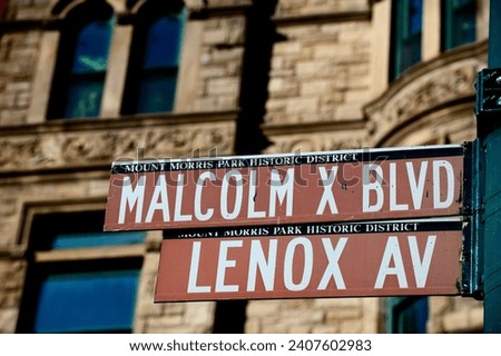 New York Malcom X Blbd Lenox Avenue street sign in Harlem