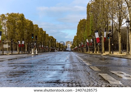 Empty Champs-Elysées during the 11th of November Armistice Day. Royalty-Free Stock Photo #2407628575