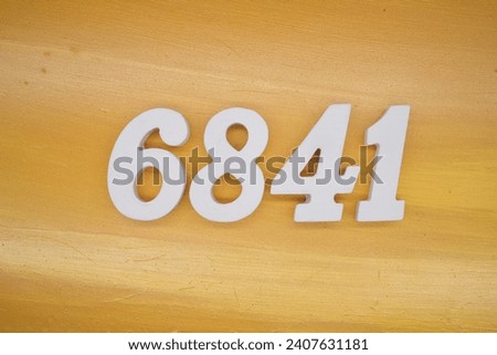 The golden yellow painted wood panel for the background, number 6841, is made from white painted wood.