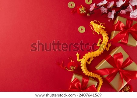 Honoring customs with thoughtful Chinese New Year gifts. Top view flat lay of gold dragon, gift boxes, sakura bloom, lucky coins, lanterns on red background with ad space