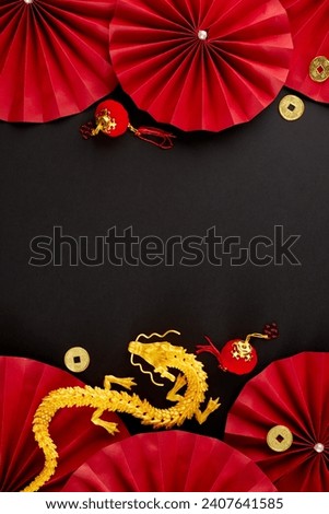 Infusing spaces with the vibrant Chinese New Year theme. Top view vertical photo of gold dragon, folding fans, lanterns on black background with advert space