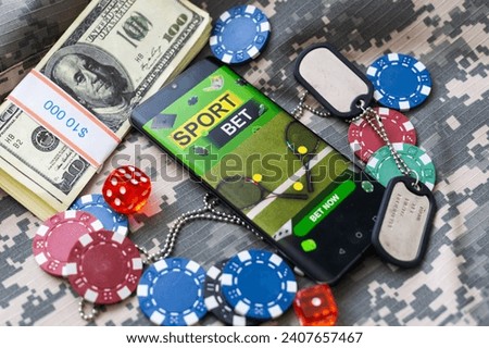 game chips with a column of bucks of dollars laid out after the game. Poker concept
