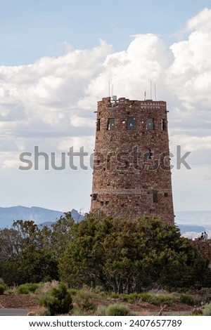 An old watchtower at Grand Canyon National Park, standing as a historic structure on the South Rim. The vintage watchtower, with its architectural detail and cultural significance, provides a glimpse 