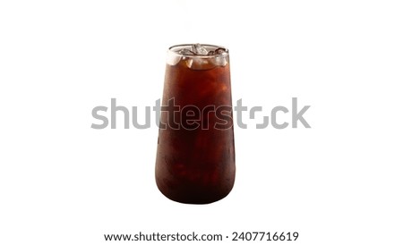 Cold Brew Iced Coffee In A Clear Cup On A White Background, Iced latte coffee on plastic glass and tube-sucking isolated white background, summer drink concept, Iced Americano on white background Royalty-Free Stock Photo #2407716619