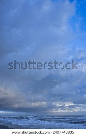 Winter storm clouds at dawn in the Atlantic ocean off Indialantic Florida