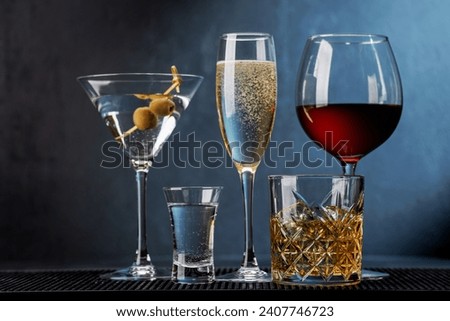 Whiskey, wine, champagne, cocktail drinks, elegant and enticing. With copy space Royalty-Free Stock Photo #2407746723