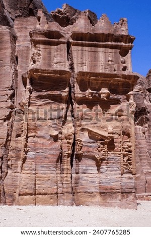 Jordan Petra. Petra is capital of Nabataean kingdom. Ruins of ancient temples carved into colored rocks on territory of Nabataean kingdom. Jordan's historical landmark of international significance. Royalty-Free Stock Photo #2407765285