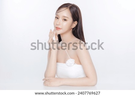 Young Asian woman long hair with clean fresh skin Korean makeup on white background, Female model Face care, Facial treatment, Cosmetology, beauty and spa, Asian women portrait. Royalty-Free Stock Photo #2407769627